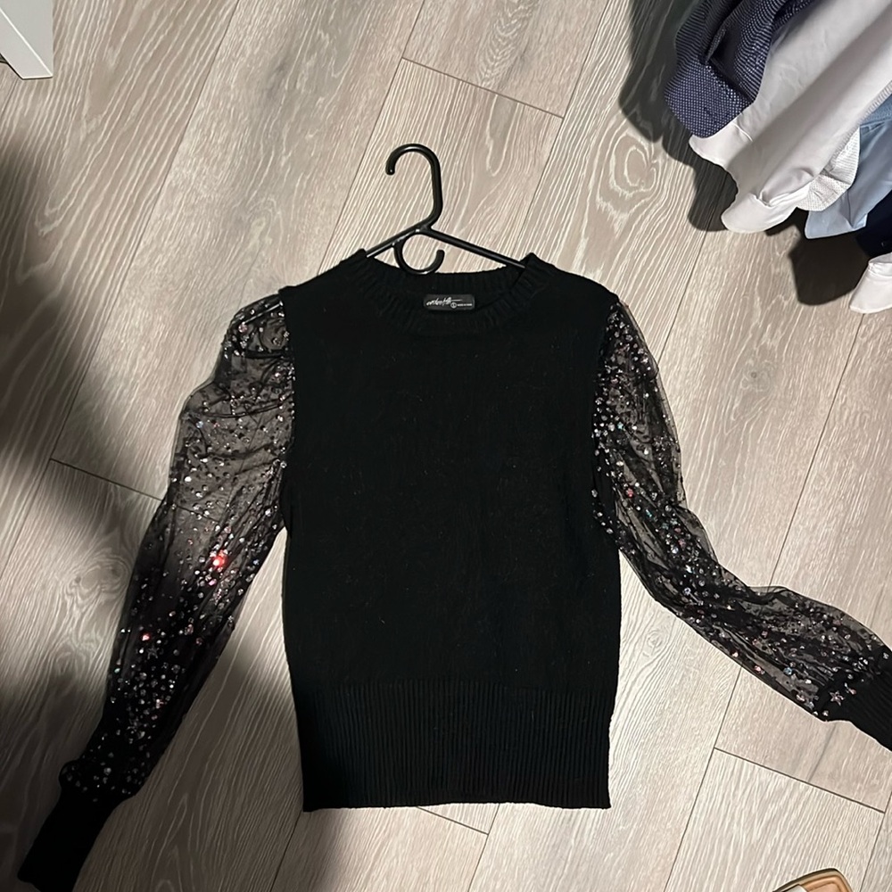 Black mesh sweater with sparkle sleeves